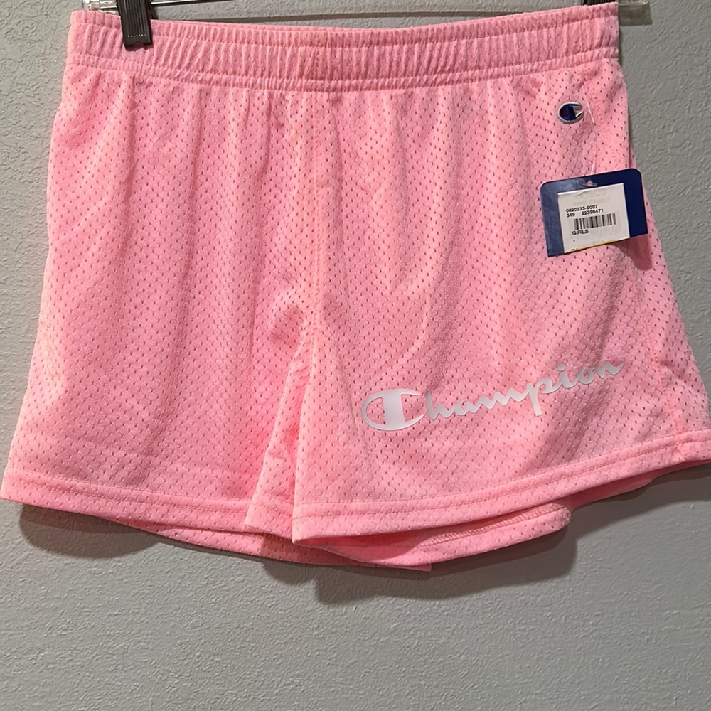 girls champion shorts. New with tags. Pink. Size large.